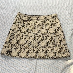 Black and gold mini skirt